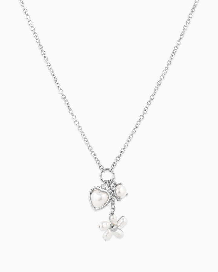 Silver Y-drop charm necklace featuring pearl heart, pearl bead, and pearl flower pendants