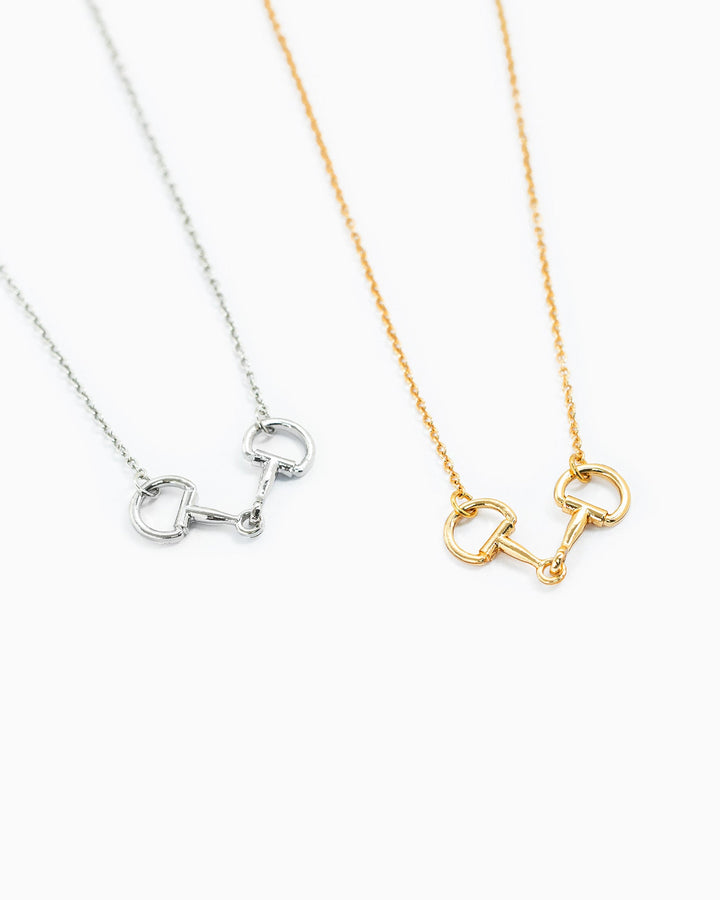 Sessori Western Double Linked Horsebit Necklace shown in silver and gold variants on delicate chains.
