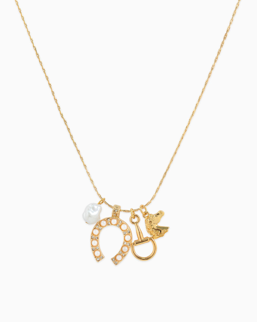 Gold charm necklace featuring horseshoe with pearls, horse bit, bird, and baroque pearl charms