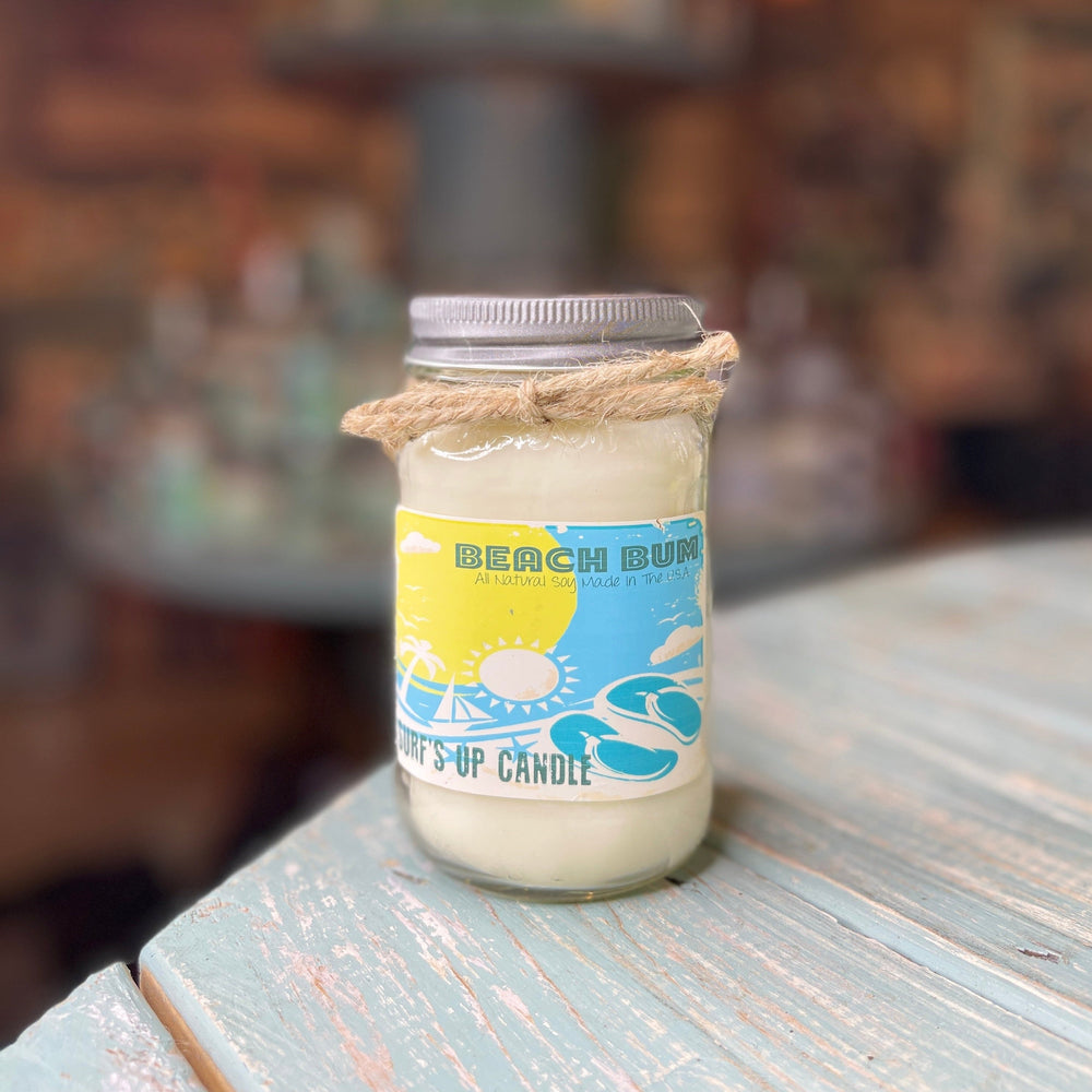 Beach Bum Surf's Up Candle in mason jar with yellow-blue label and twine bow