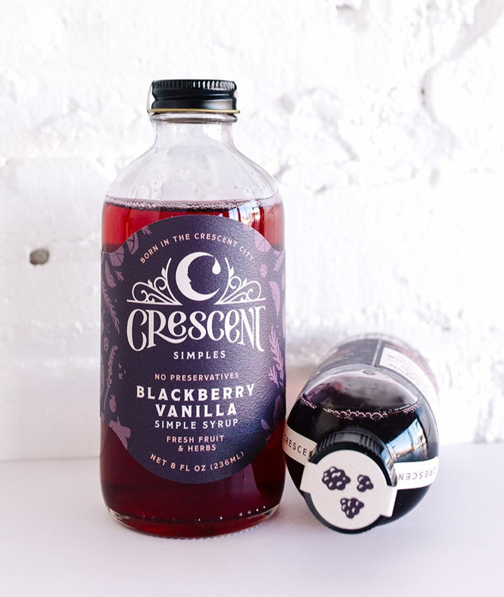 Crescent Simples Blackberry Vanilla Simple Syrup bottle with dark purple liquid and black cap