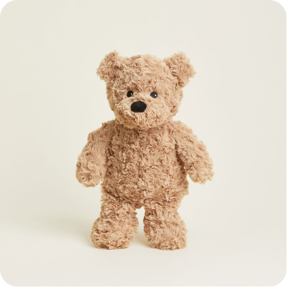 Brown curly textured Warmies teddy bear plush toy on white background