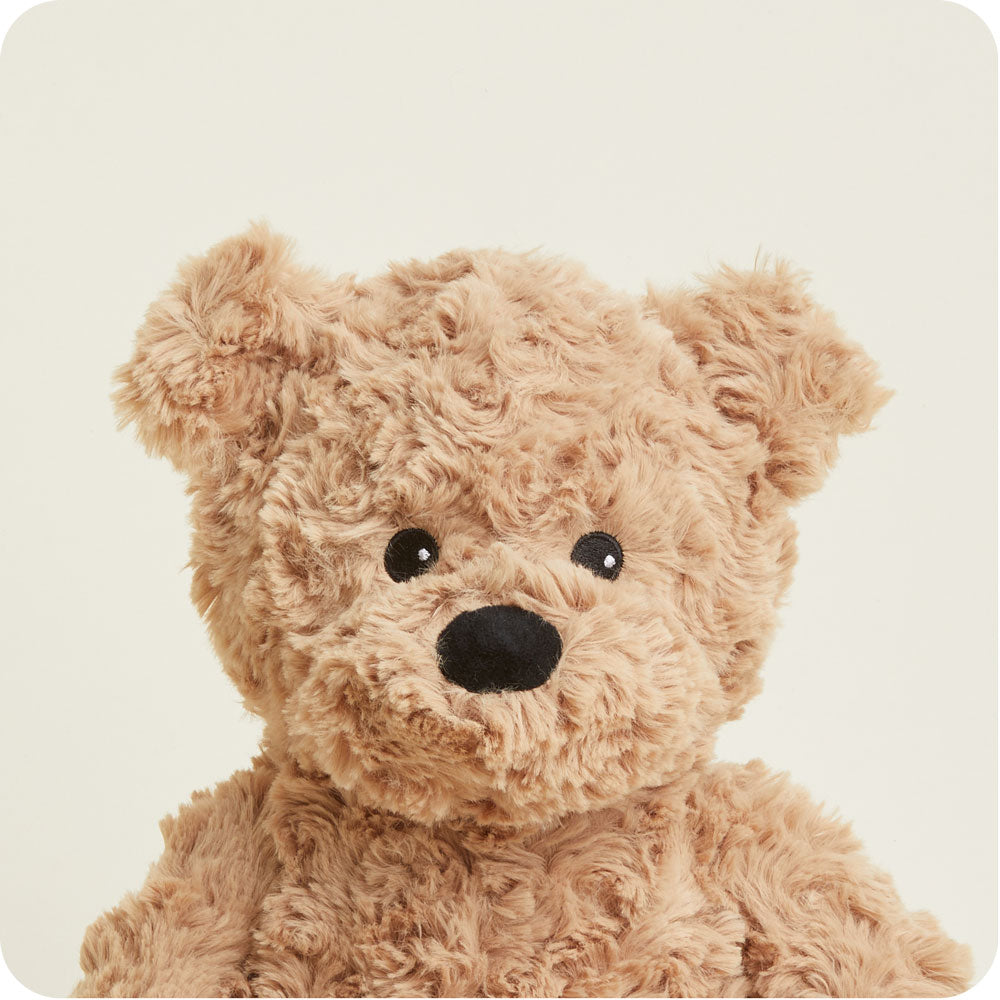 Brown curly textured Warmies teddy bear with black nose and eyes on white background