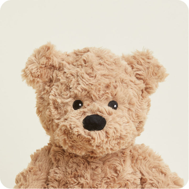 Brown curly textured Warmies teddy bear with black nose and eyes on white background