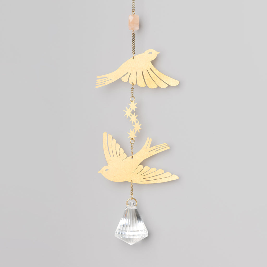 Scout gold bird suncatcher with flying bird silhouettes, stars, and crystal prism