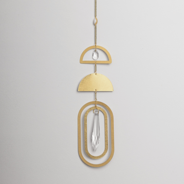 Scout gold brass suncatcher with geometric shapes and hanging crystal elements