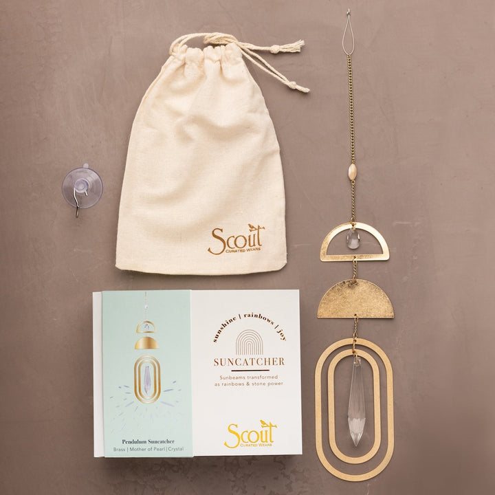 Scout Pendulum Suncatcher with gold geometric frame and clear crystal pendant