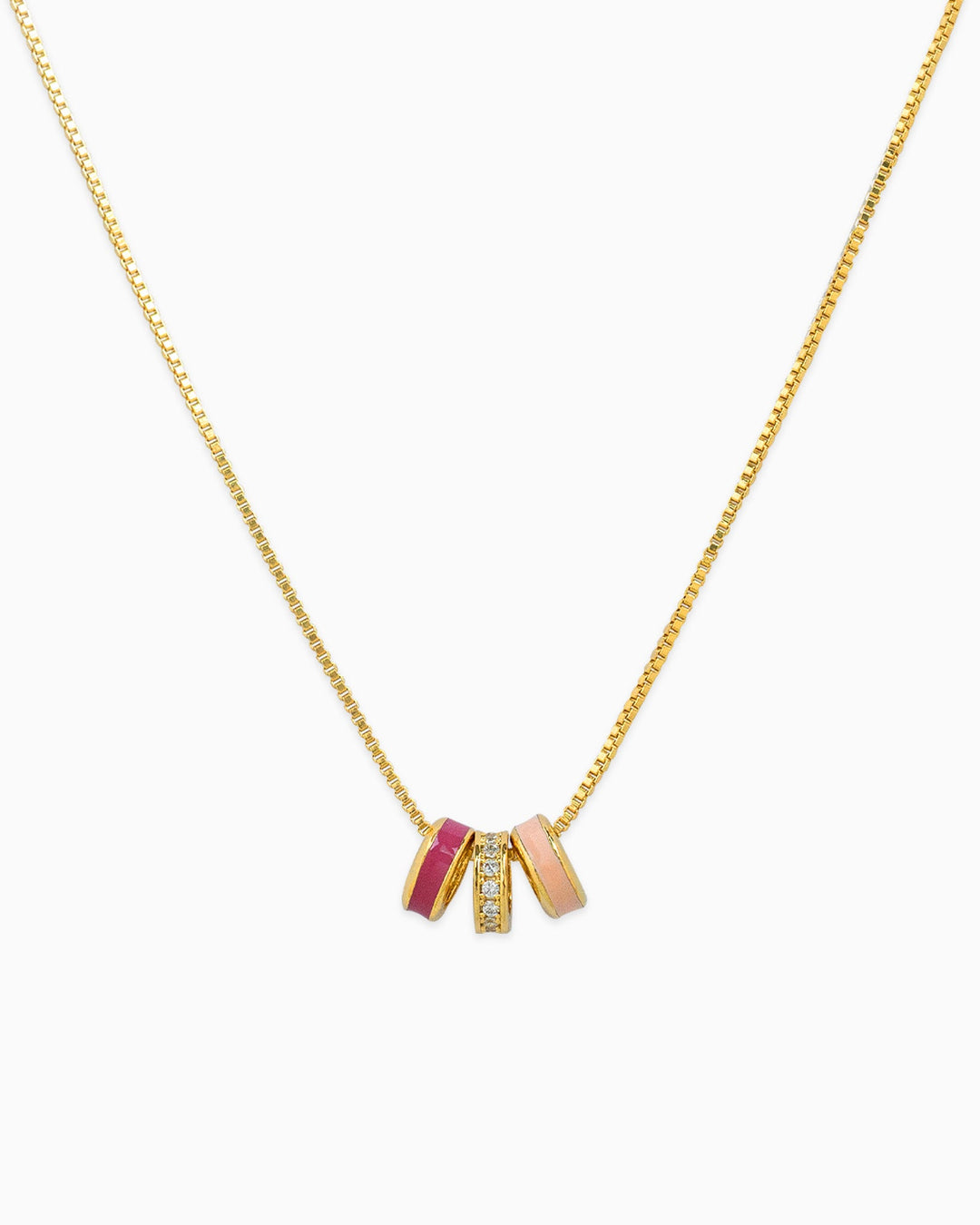 Gold box chain necklace with pink enamel and crystal CZ rondelle ring beads as pendant