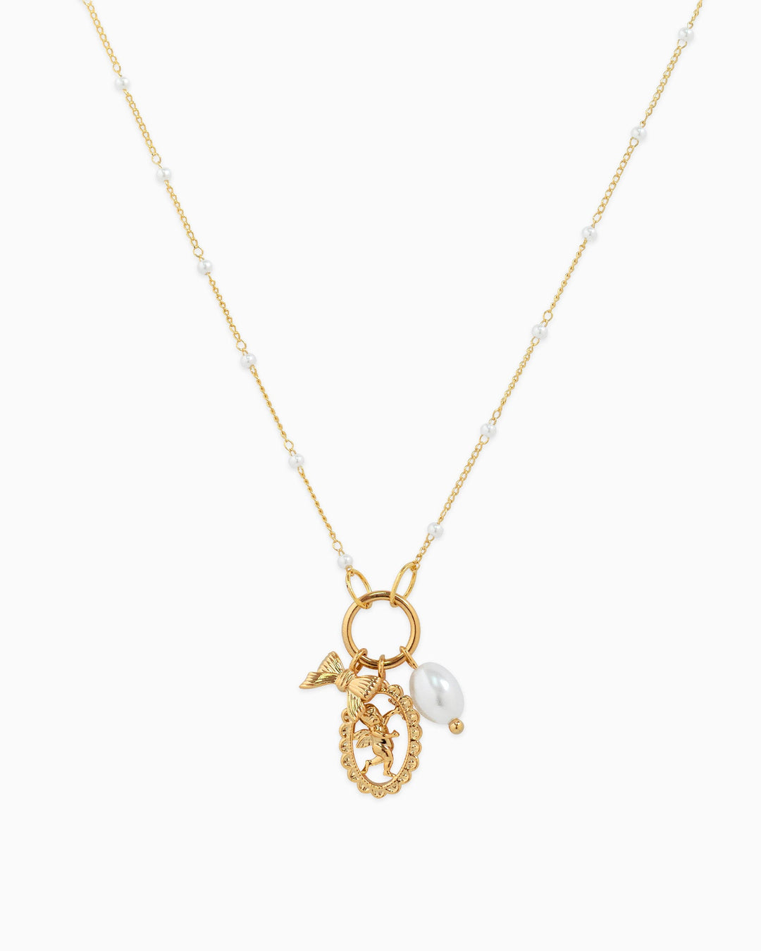 Gold-tone necklace with pearl-studded chain, angel medallion charm, butterfly charm, and baroque pearl drop.