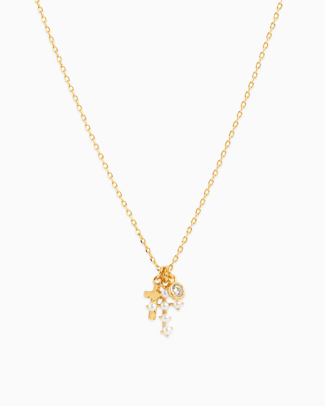 Sessori gold chain necklace with pearl cross charm, crystal pendant, and star charm