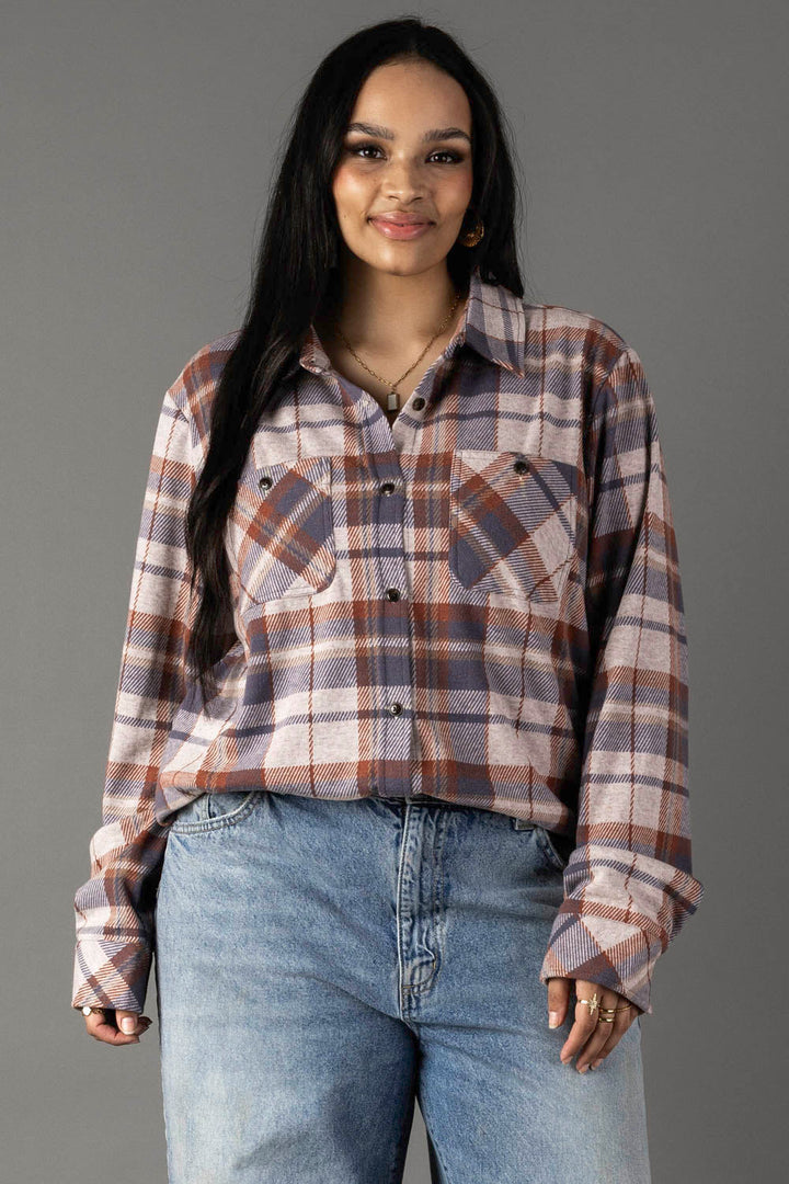 Women's cream dusty blue and tan plaid flannel button-up shirt with chest pockets