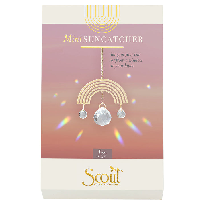 Scout Mini Suncatcher with gold rainbow design and crystal prisms creating rainbow light reflections
