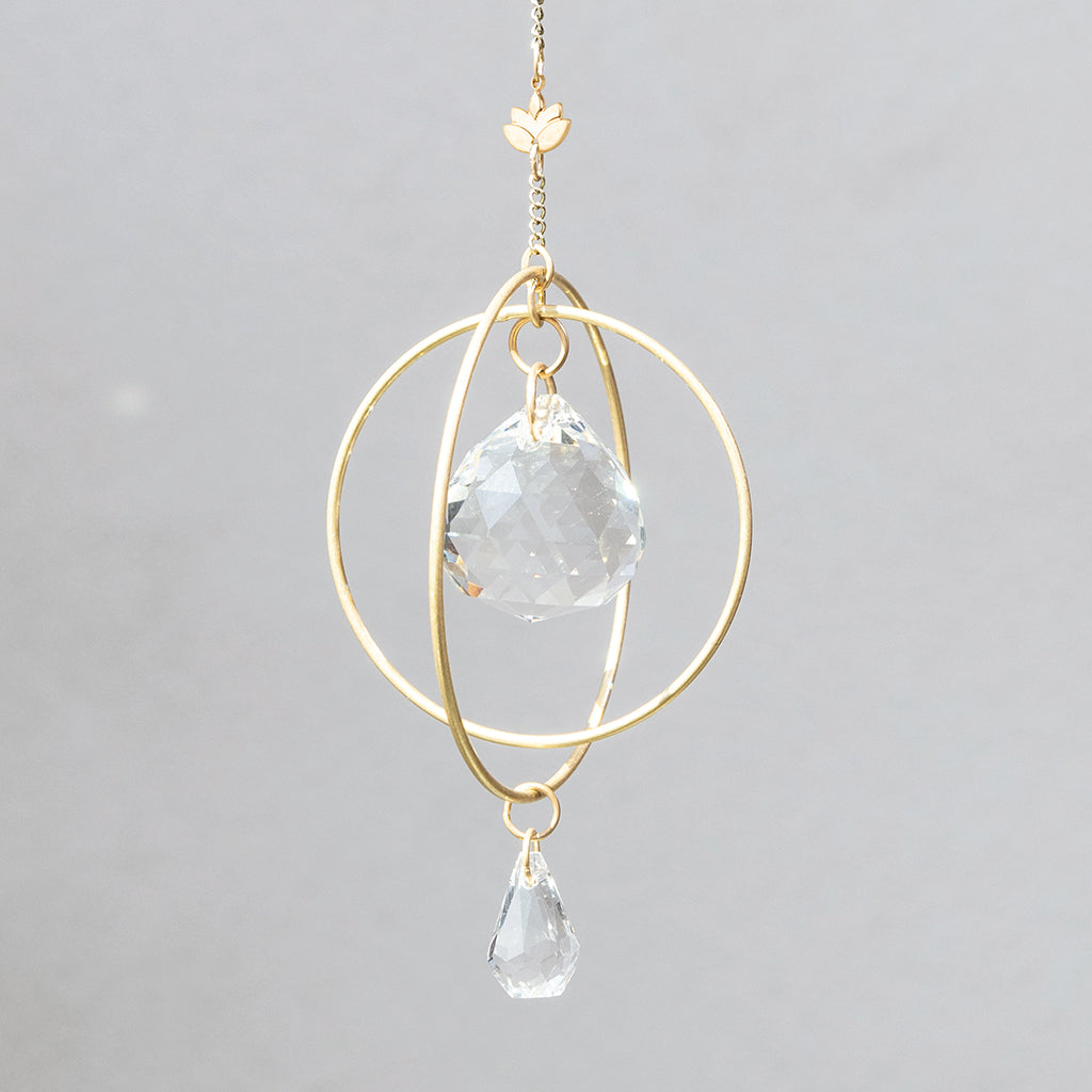 Scout Mini Suncatcher in Lotus with gold geometric frame and clear crystal prisms