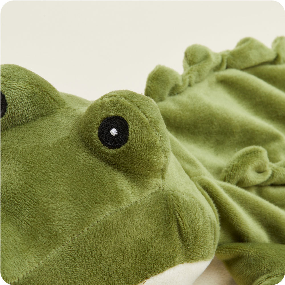 Green alligator Warmies plush toy with black embroidered eye on clean background