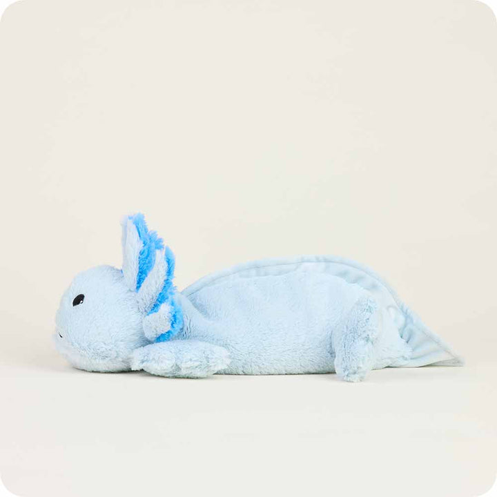 Warmies light blue axolotl plush toy lying on white background