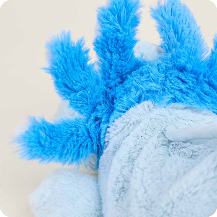 Blue axolotl Warmies plush toy with fuzzy blue exterior fins and white knitted belly