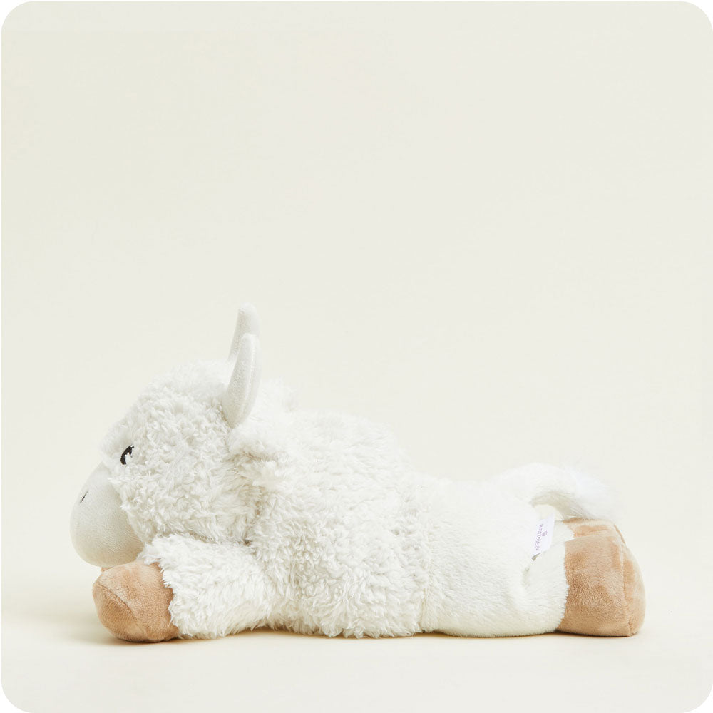 White fluffy unicorn Warmies stuffed animal with tan hooves on clean background