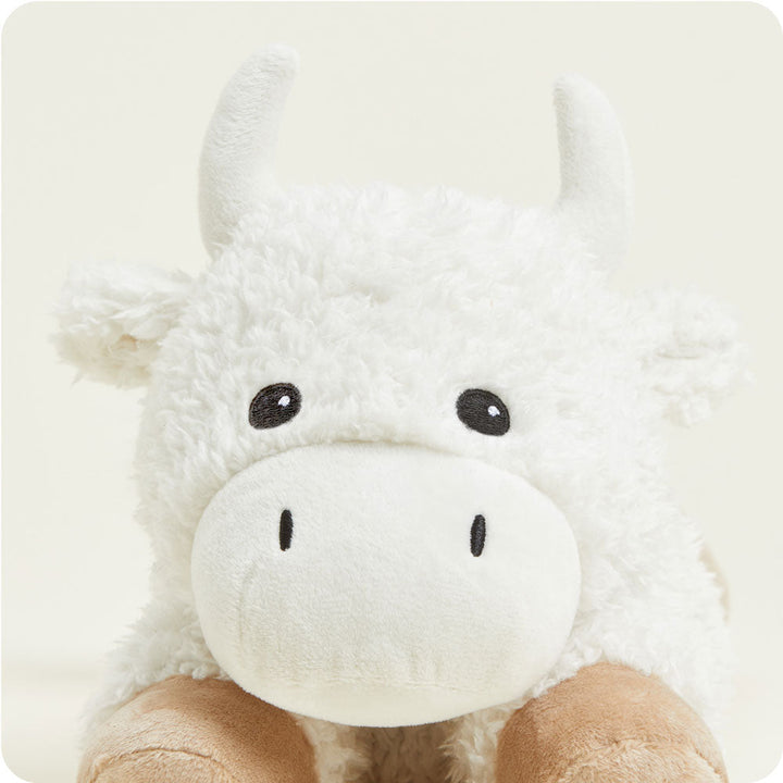 Warmies white plush cow stuffed animal with embroidered face and brown hooves