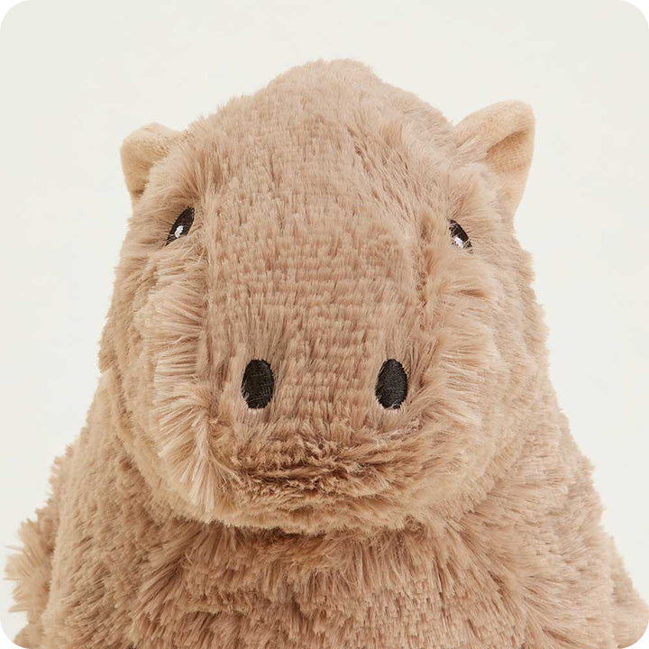 Warmies plush capybara stuffed animal in light brown tan color against white background