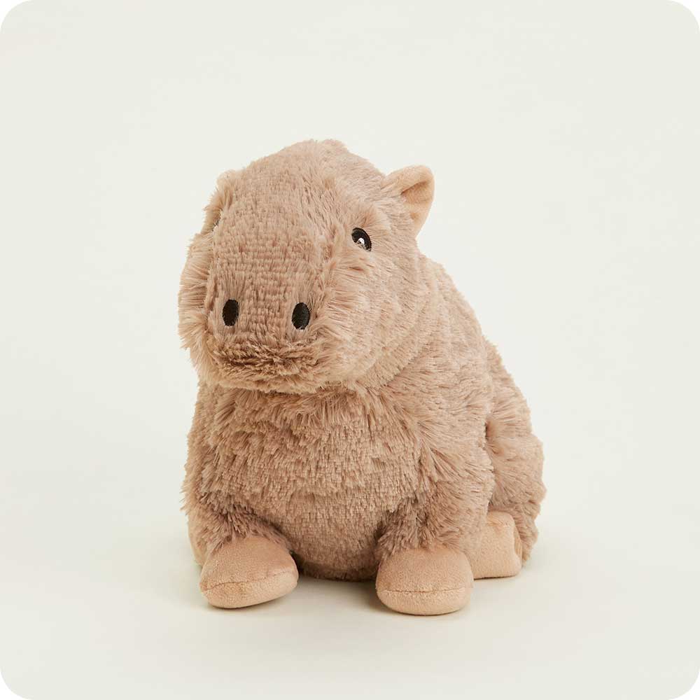 Warmies light brown capybara plush toy sitting against white background