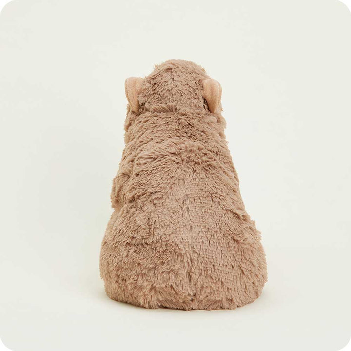 Warmies plush capybara heating pad stuffed animal in light brown color from behind