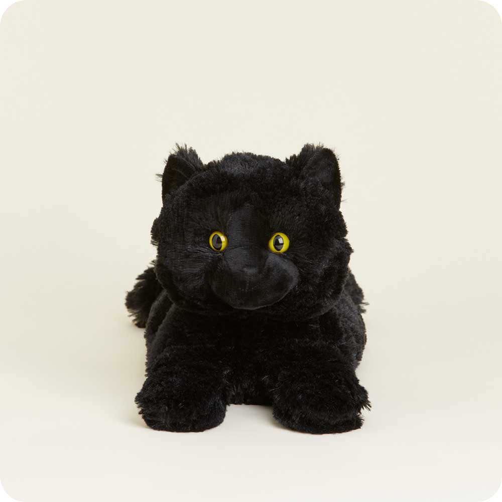 Warmies black cat plush toy with yellow eyes on white background