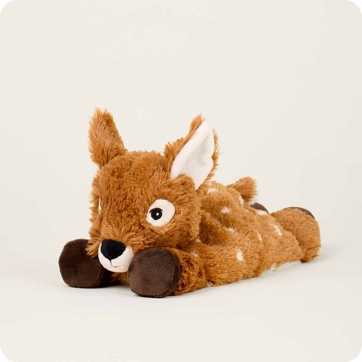 Warmies plush brown deer stuffed animal in laying down position with white ears