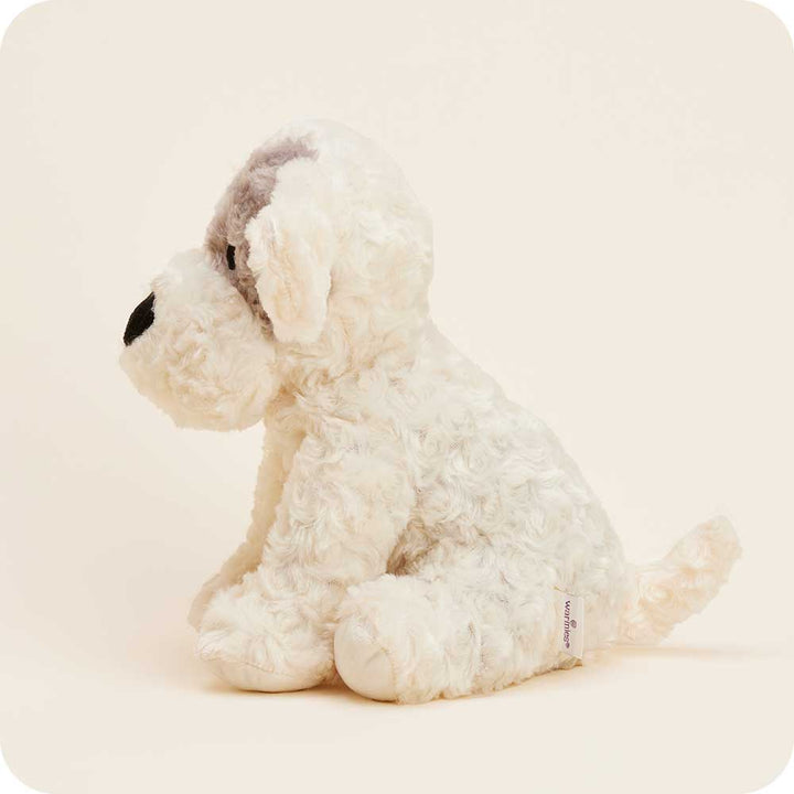 Warmies cream colored curly plush dog stuffed animal with brown ears on white background
