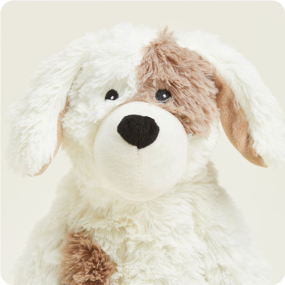 Warmies plush stuffed puppy toy in cream and brown coloring with soft fur texture