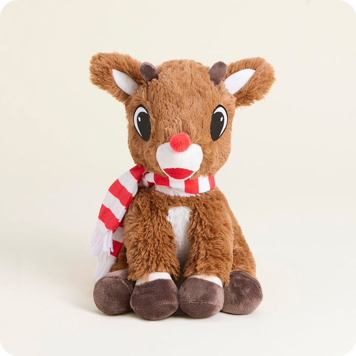 Warmies brown reindeer plush toy with glowing red nose wearing striped scarf