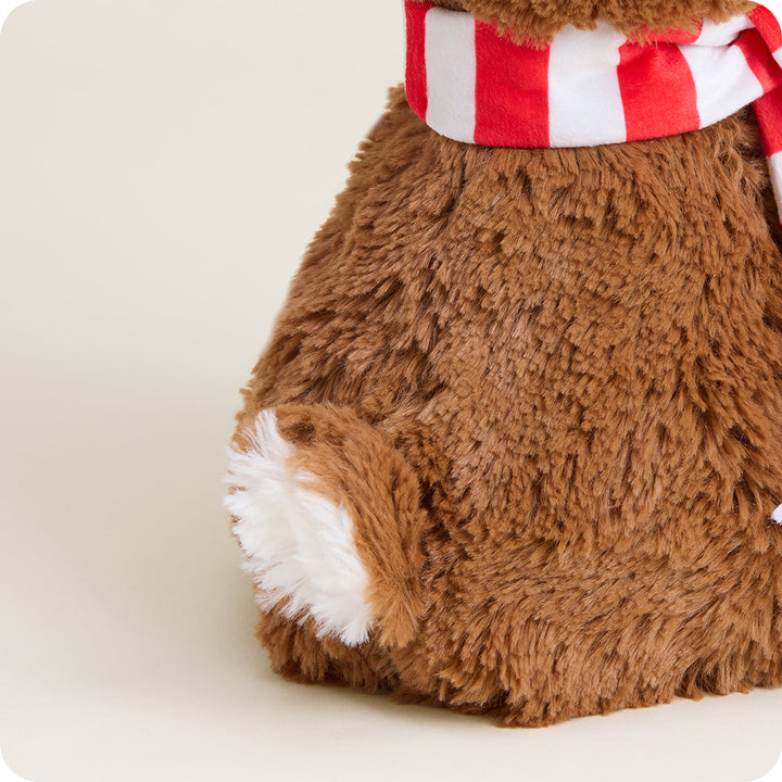 Brown Warmies plush reindeer with red and white striped scarf on white background