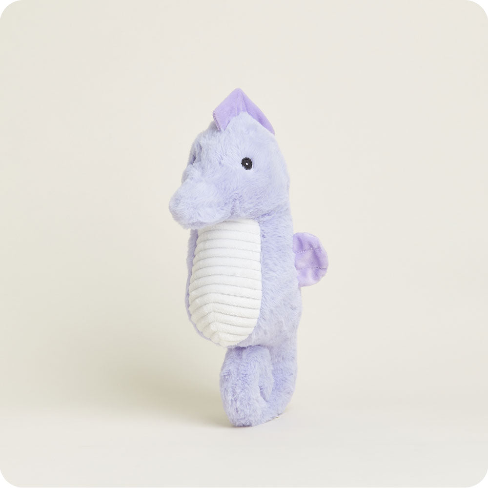 Warmies purple seahorse plush toy with white ribbed belly against clean background