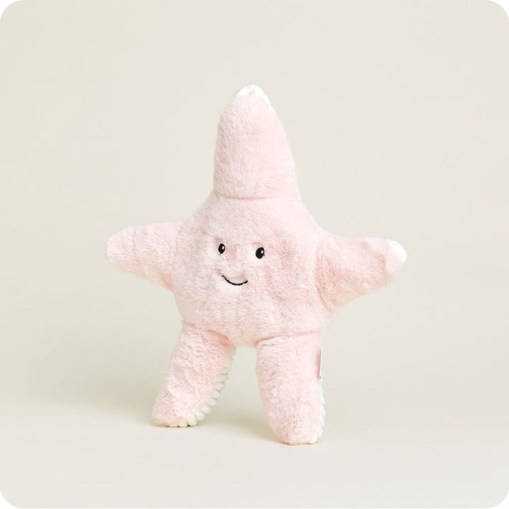 Pink plush Warmies starfish stuffed animal with cute face and soft fuzzy texture