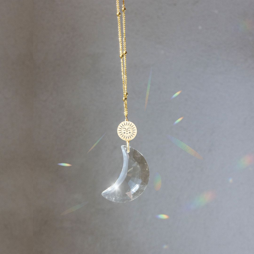 Scout Pocket Suncatcher with clear crystal moon and gold sunface charm on chain
