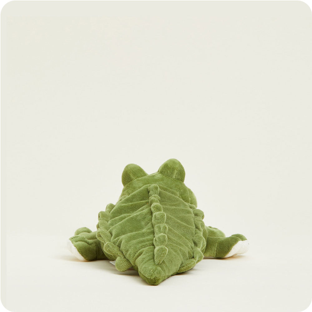 Green plush alligator Warmies stuffed animal on white background