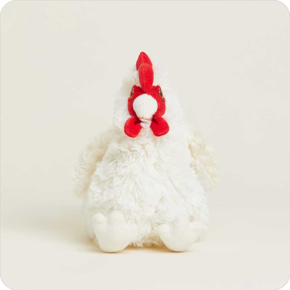 White plush chicken stuffed animal with red comb and wattles on clean background