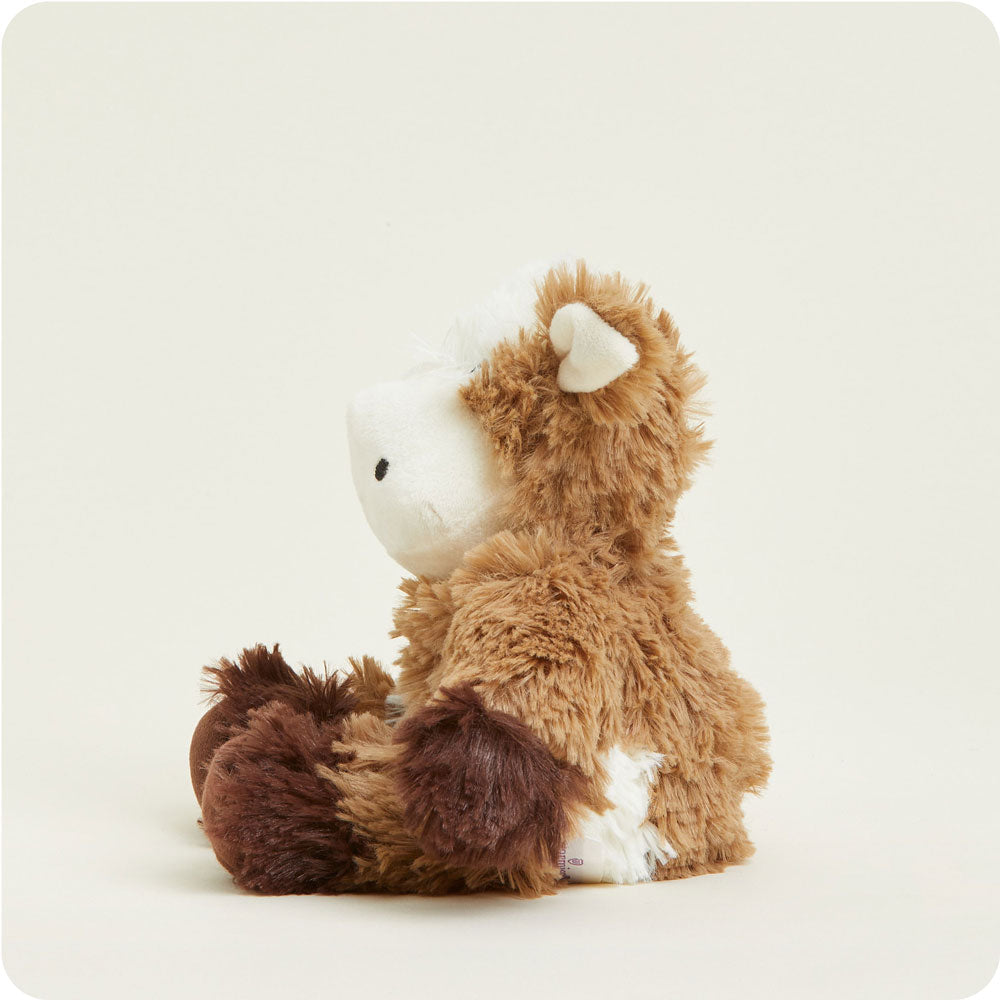 Warmies Junior plush brown cow stuffed animal with fluffy fur and white face