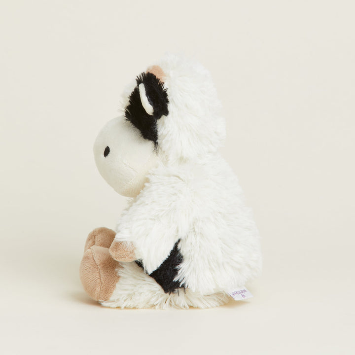 Warmies Junior plush cow stuffed animal in white with black cow spots