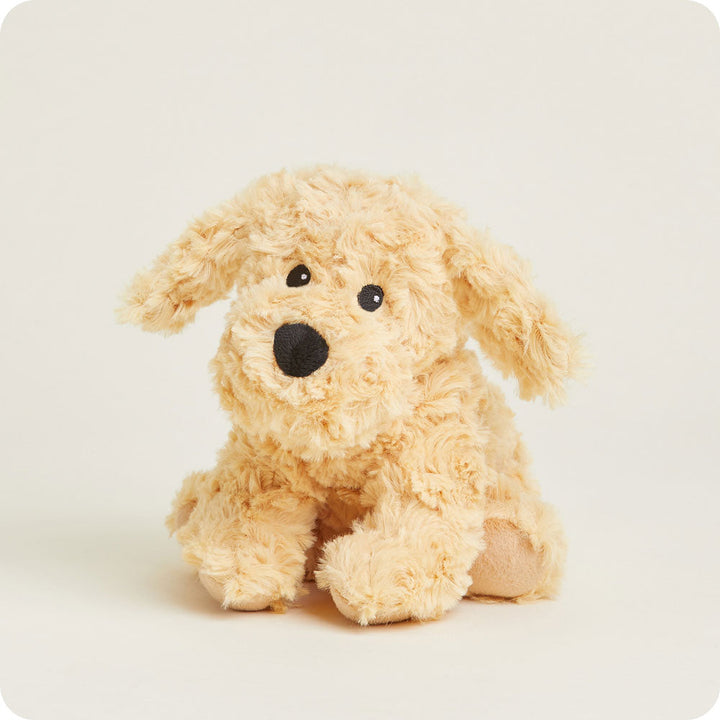 Warmies Junior golden plush dog stuffed animal with curly fur on white background
