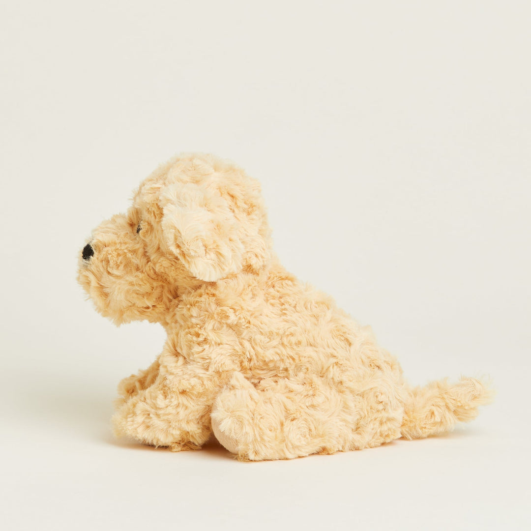 Warmies Junior golden plush dog stuffed animal sitting against white background