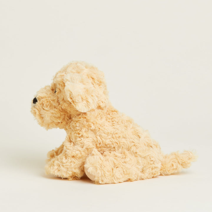 Warmies Junior golden plush dog stuffed animal sitting against white background
