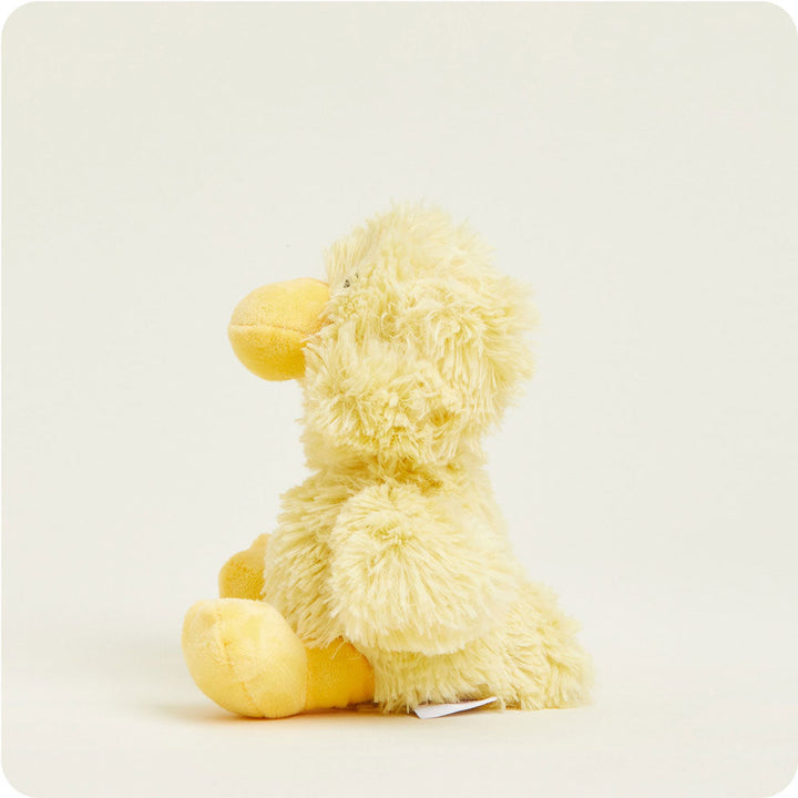 Warmies Junior yellow duck plush toy with fluffy texture against white background
