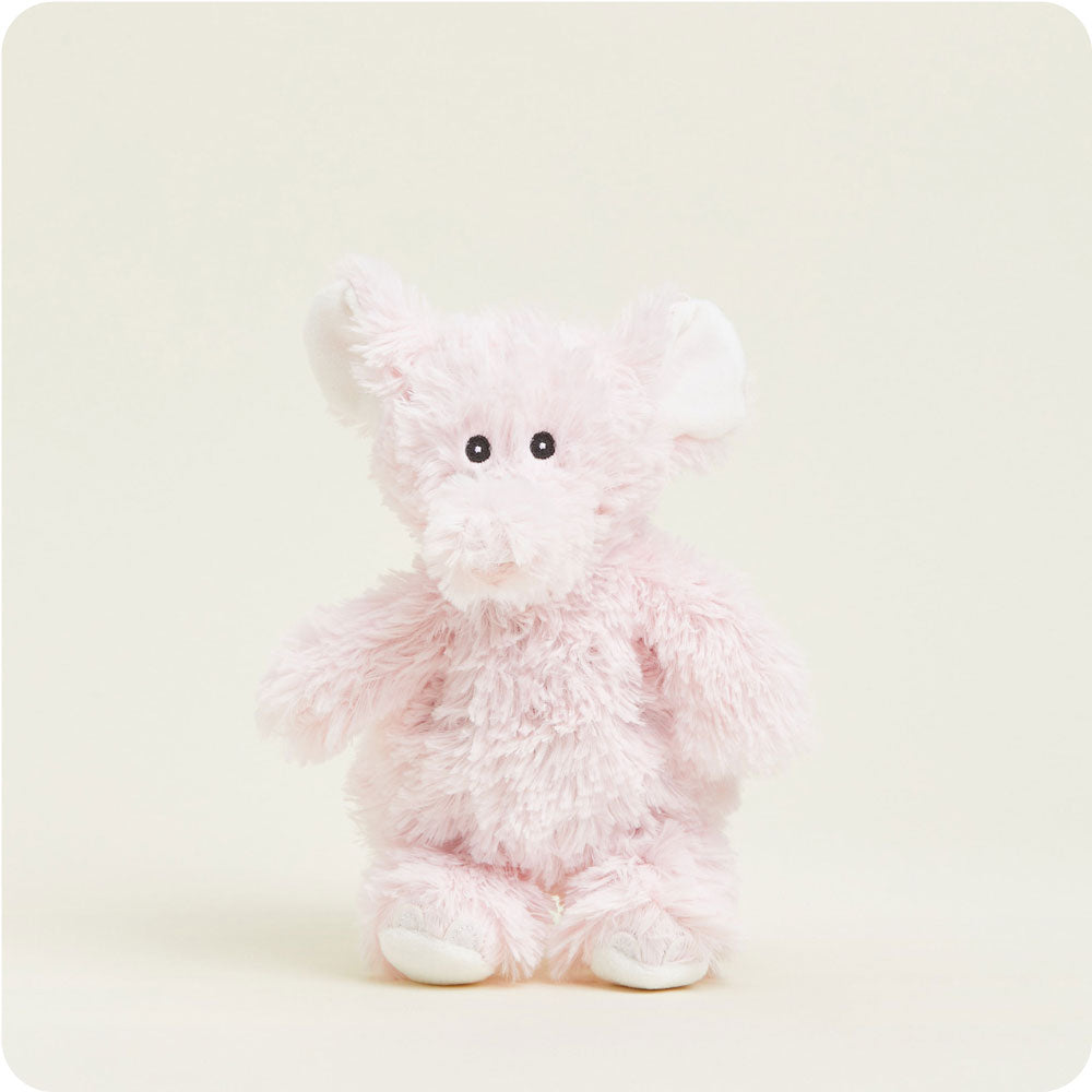 Pink fluffy teddy bear plush toy with black button eyes on white background