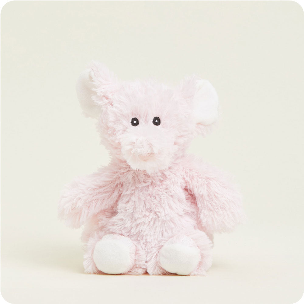 Pink fluffy elephant plush toy with white accents and black button eyes