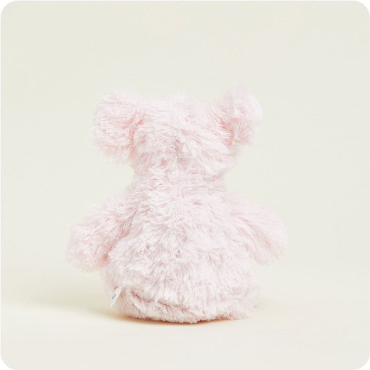 Warmies Junior pink plush teddy bear stuffed animal on white background