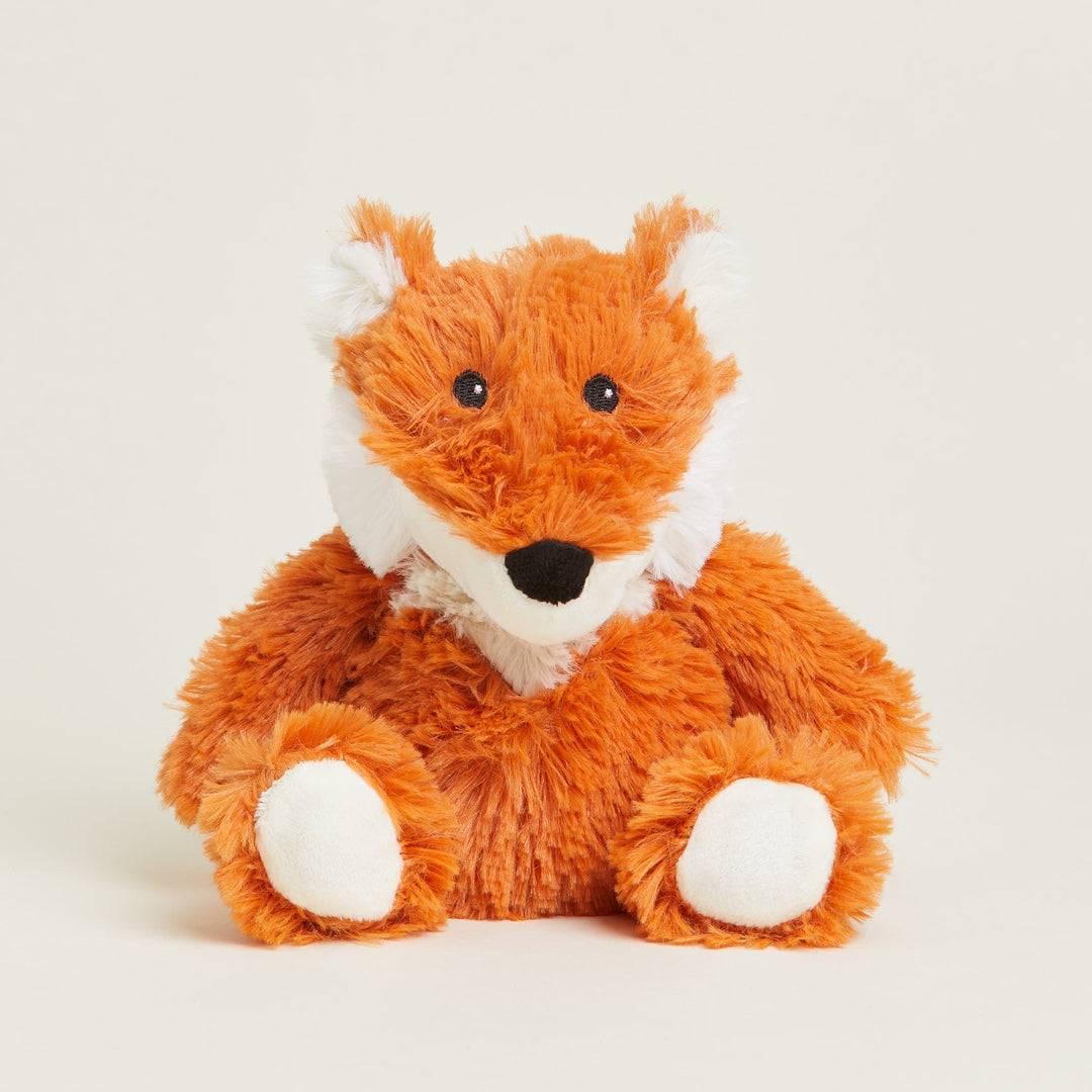 Orange and white plush fox stuffed animal with black nose and eyes