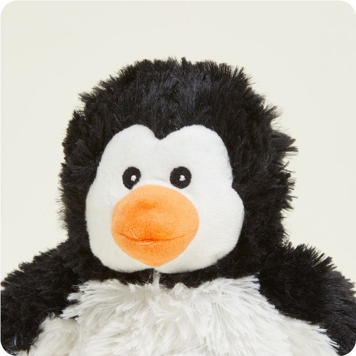 Warmies Junior plush penguin stuffed animal with black body, white chest, and orange beak