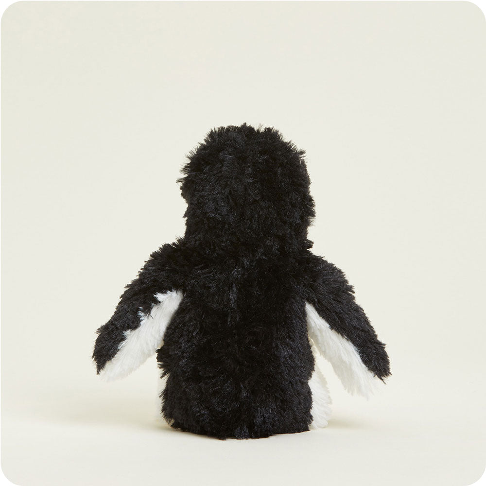 Junior Warmies black and white penguin plush toy with fluffy texture