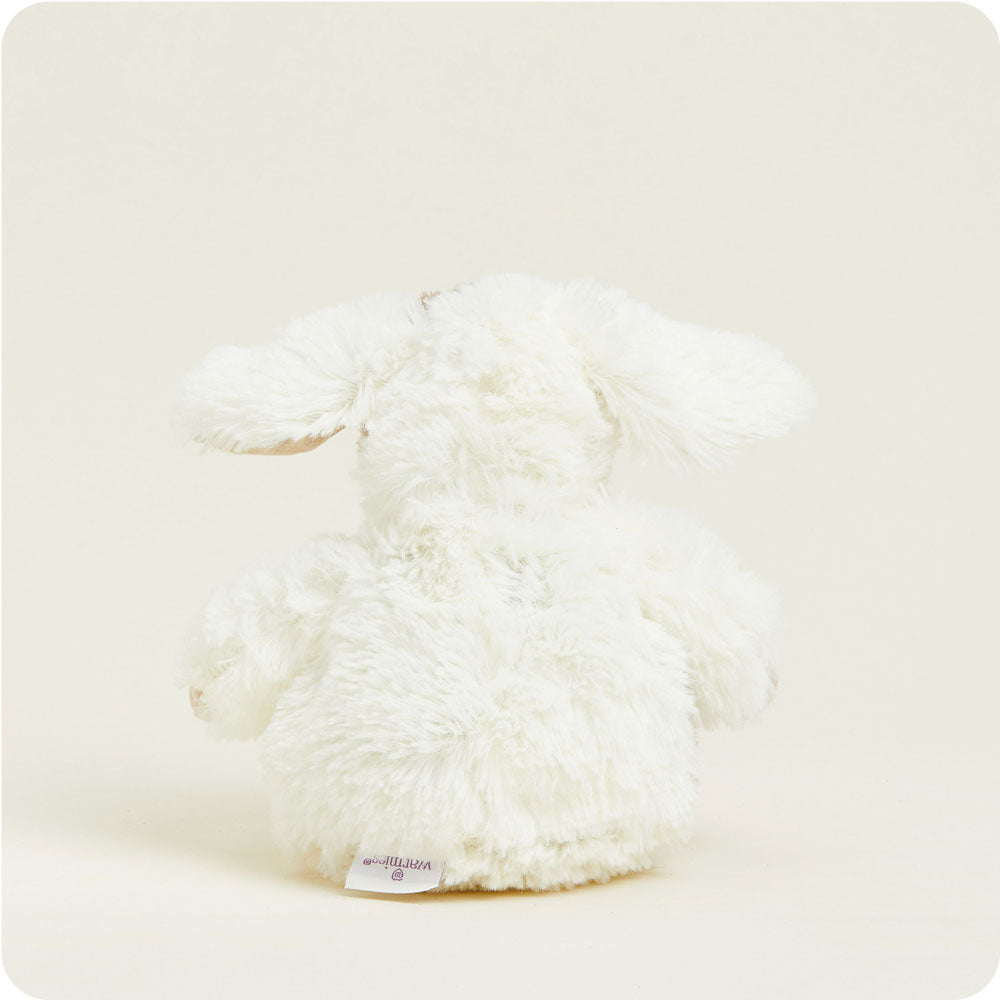 Warmies Junior plush puppy stuffed animal in cream white color with fuzzy fur texture