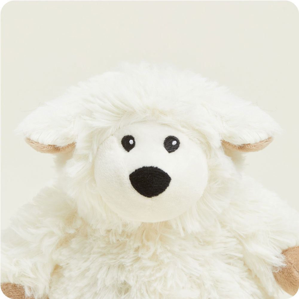 Warmies Junior plush sheep toy in cream white with black embroidered face